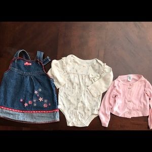 Baby girl’s dress, onesie and camisole.